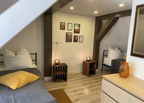 2 chambres, fer et planche à repasser, Wi-Fi, draps fournis