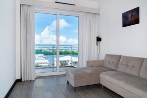 Smart TV - Sunset Suite 501 | Lagoon-View 1BR with Balcony at The Watermark Hotel (San Pedro)