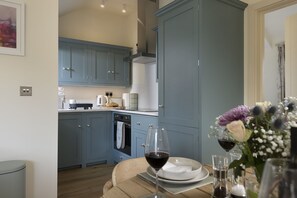 Fridge, stovetop, coffee/tea maker, highchair