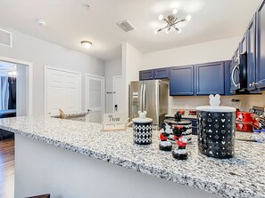 Fridge, microwave, oven, stovetop - Charming 2BR Condo Near Disney  + Resort Amenities (Kissimmee)