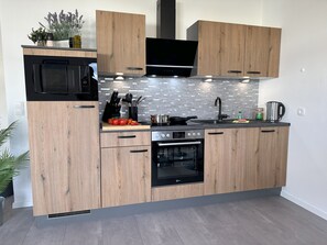 Refrigerador, microondas, horno, placa de cocina