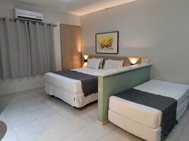 Suite, City View | Hypo-allergenic bedding, desk, laptop workspace, cribs/infant beds