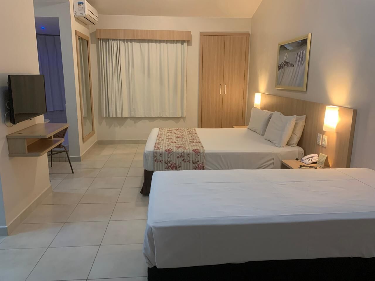 Luxury Suite, Private Bathroom, Pool View | Desk, laptop workspace, free WiFi