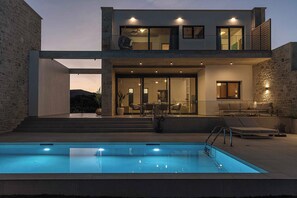 2 outdoor pools, pool umbrellas, pool loungers