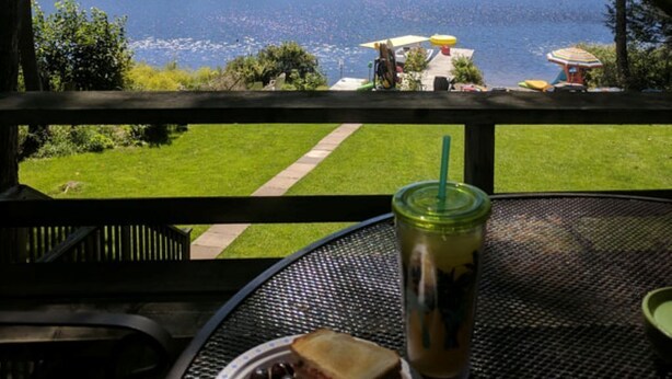 A lakeside view from a deck with a table, a drink, and a plate of food. - Oars n Smores
A place to call yours. (Georgian Bay)