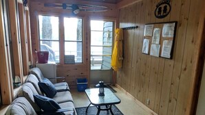 A room with a sofa, a table, and a bulletin board with notices. - Oars n Smores
A place to call yours. (Georgian Bay)