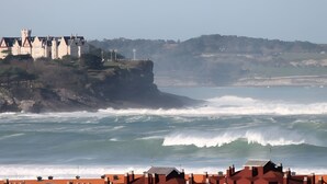 A coastal castle with a view of the ocean.
