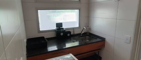 Fridge, microwave, stovetop, cookware/dishes/utensils