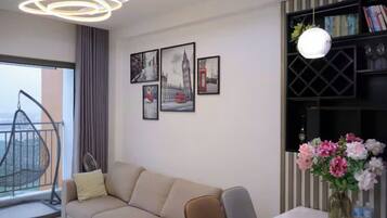 Presidential Suite, 2 Bedrooms, Club lounge access, City View | Living area | 65-inch Smart TV with cable channels, fireplace, Netflix