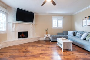 Smart TV, fireplace, table tennis, books