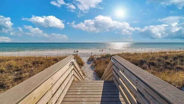 A wooden boardwalk leading to a beach with clear skies and sunlight. - Luxury Home, Sleeps 16, Palm & Pearl, Pool, Inlet Beach (Inlet Beach)