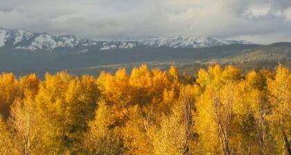 Spectacular Rocky Mountain Views + Stream Hiking at this Custom Built Getaway
