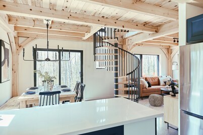 Discover Falcon Ridge's Charming Post and Beam Lake Retreat | Laurentians