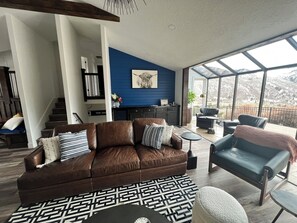 Smart TV, fireplace, books