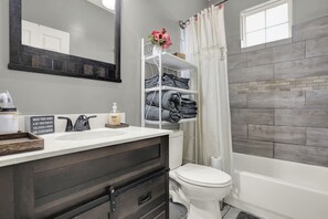 Hair dryer, towels, soap, toilet paper