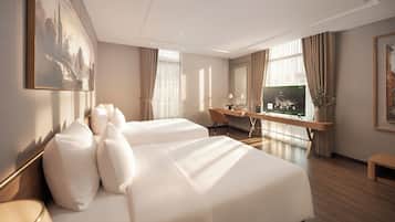 A hotel room with two beds, a desk, a TV, and a large window.