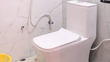 Shower, towels, soap, shampoo