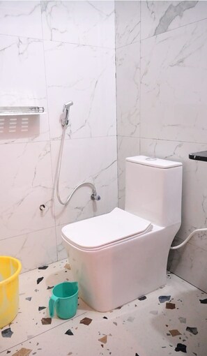 Shower, towels, soap, shampoo