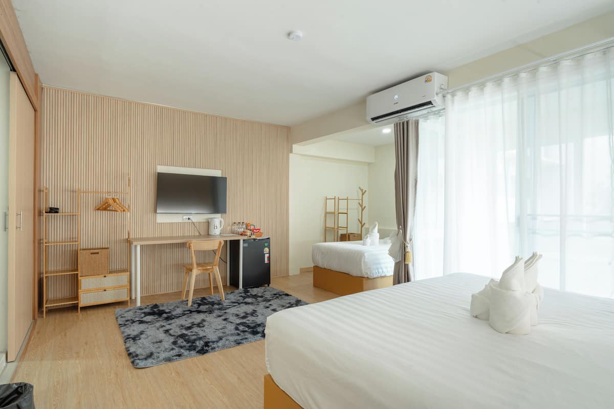 Triple Room, Balcony | Minibar, desk, iron/ironing board, free WiFi