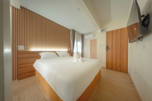 Chambre Simple | Bureau, fer et planche à repasser, Wi-Fi gratuit