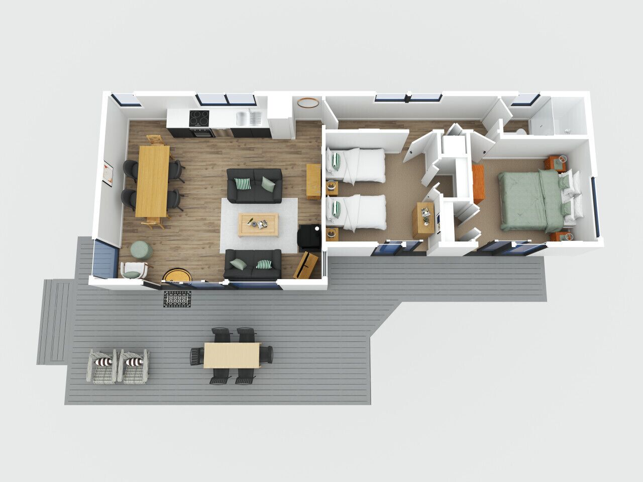 Un appartement de deux chambres comprenant une cuisine, un coin repas et un balcon.