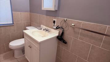 Hair dryer, towels, soap, toilet paper