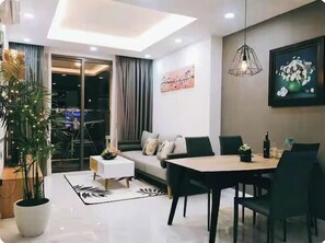 Presidential Suite, 2 Bedrooms, Club Lounge Access, City View | Living area | 65-inch Smart TV with cable channels, fireplace, Netflix