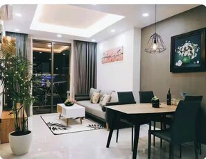 Presidential Suite, 2 Bedrooms, Club Lounge Access, City View | Living area | 65-inch Smart TV with cable channels, fireplace, Netflix