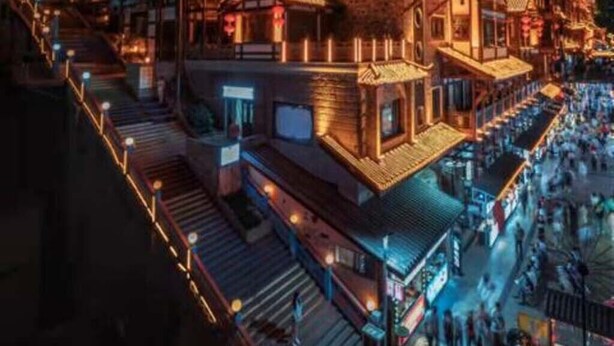 A multi-story building with traditional architecture, featuring balconies and a central courtyard. - Chongqing Lingdu Gaokong Jiangjing Hotel (Chongqing)
