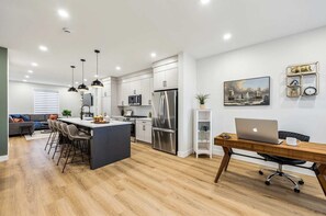 Interior - Free Parking • 3 King Beds • Desk• AC • Primary TV (Calgary)