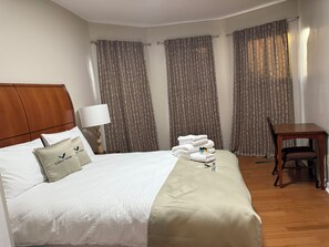 2 habitaciones, tabla de planchar con plancha y acceso a internet 