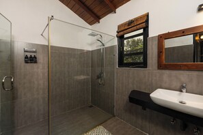 Shower, hair dryer, towels, soap