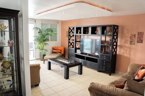 Smart TV - Family Beach Escape • Spacious 4BR Penthouse with Elevator Access (Loiza)