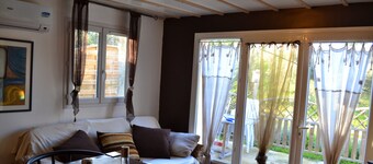 Appartement 'Rez-de-villa Taglio-Isolaccio' met Uitzicht op Bergen, Wi-Fi en Airco
