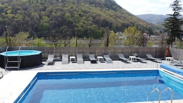 Seasonal outdoor pool, open 10:00 AM to 9:30 PM, sun loungers