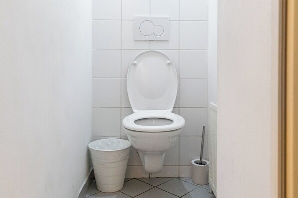 Departamento básico | Baño | Regadera, amenidades de baño gratuitas, secadora de cabello, toallas