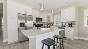 Fridge, microwave, oven, stovetop - Steps from Beach and Boardwalk with Ocean Views, Private Deck, & Parking (Ocean City)
