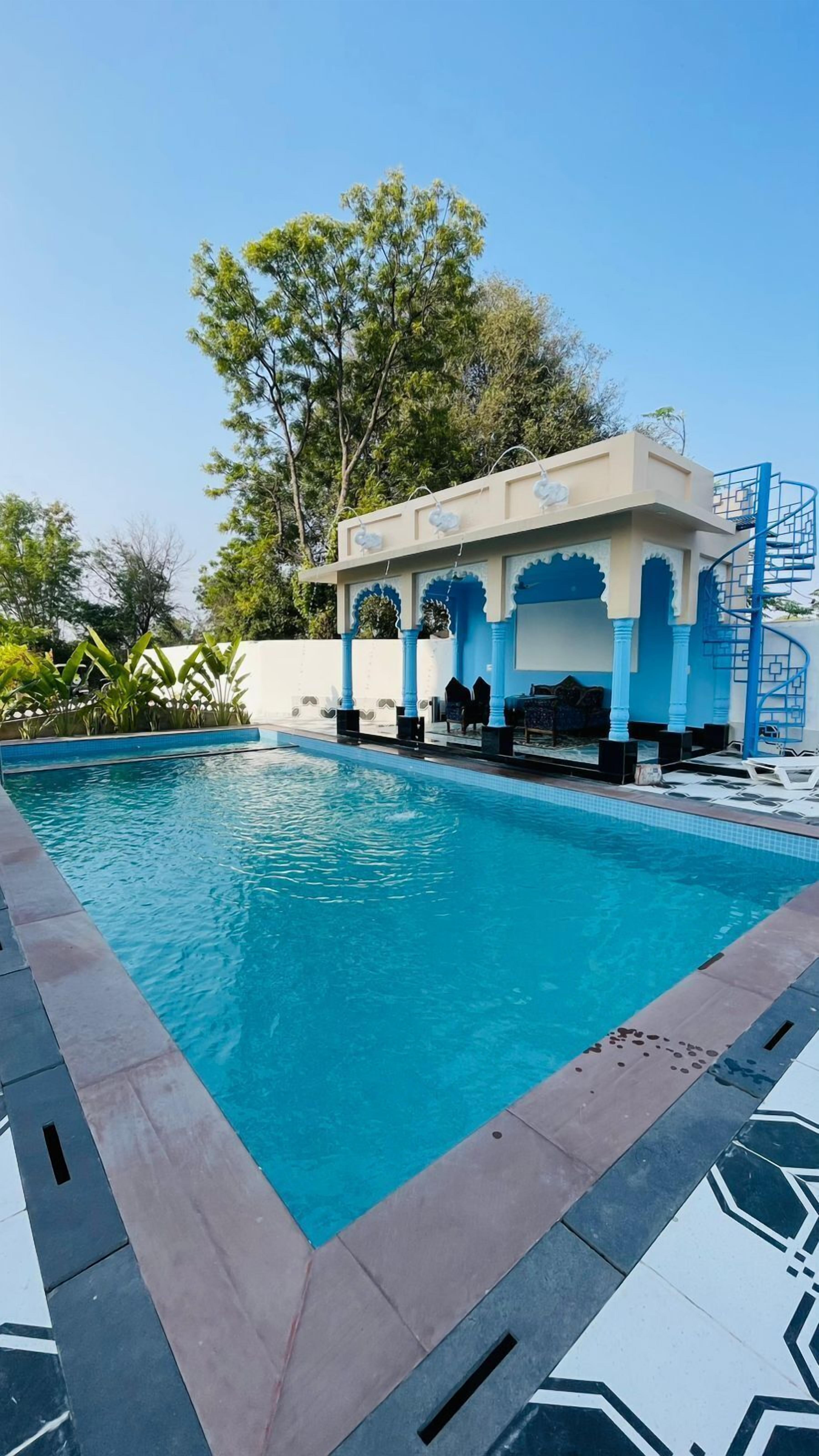 Outdoor pool, open 8:00 AM to 8:30 PM, free pool cabanas, pool umbrellas