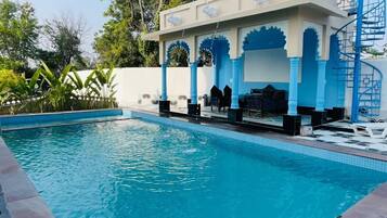 Outdoor pool, open 8:00 AM to 8:30 PM, free cabanas, pool umbrellas