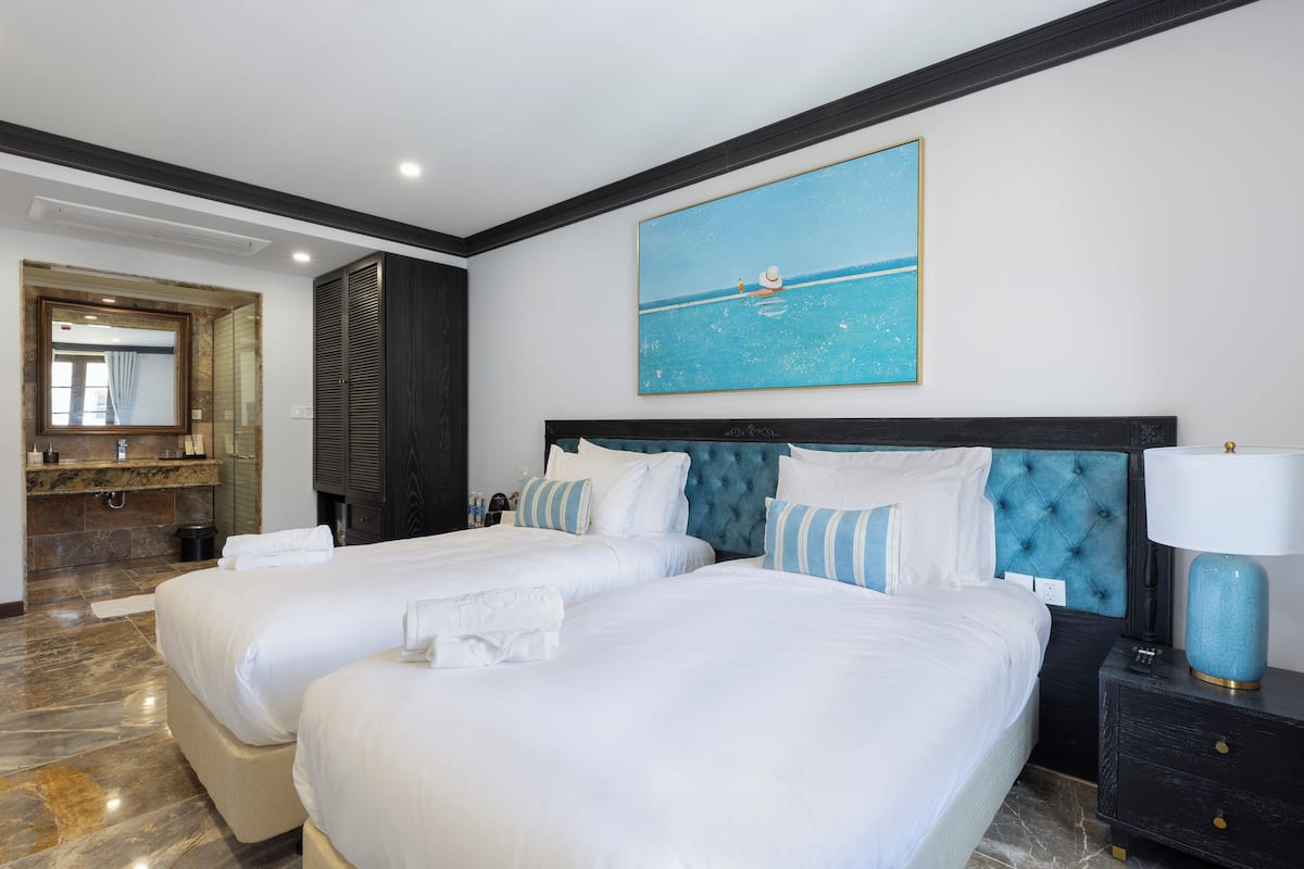 Deluxe Double Room, City View | Blackout drapes, soundproofing, free WiFi