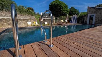 Outdoor pool, open 9:00 AM to 8:00 PM, pool umbrellas, sun loungers