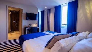 Chambre Triple vue mer | Escritorio, cortinas blackout, insonorización y wifi gratis