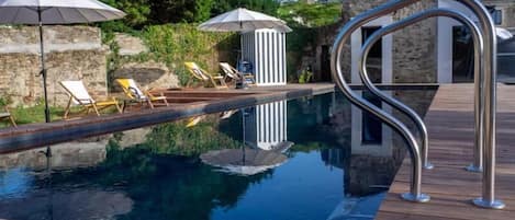 Outdoor pool, open 9:00 AM to 8:00 PM, pool umbrellas, sun loungers