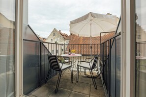 Outdoor dining - Quiet 1-room apartment with south-facing balcony in the middle of the island of Lindau (Lindau)