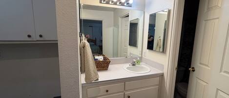 Hair dryer, towels, soap, toilet paper