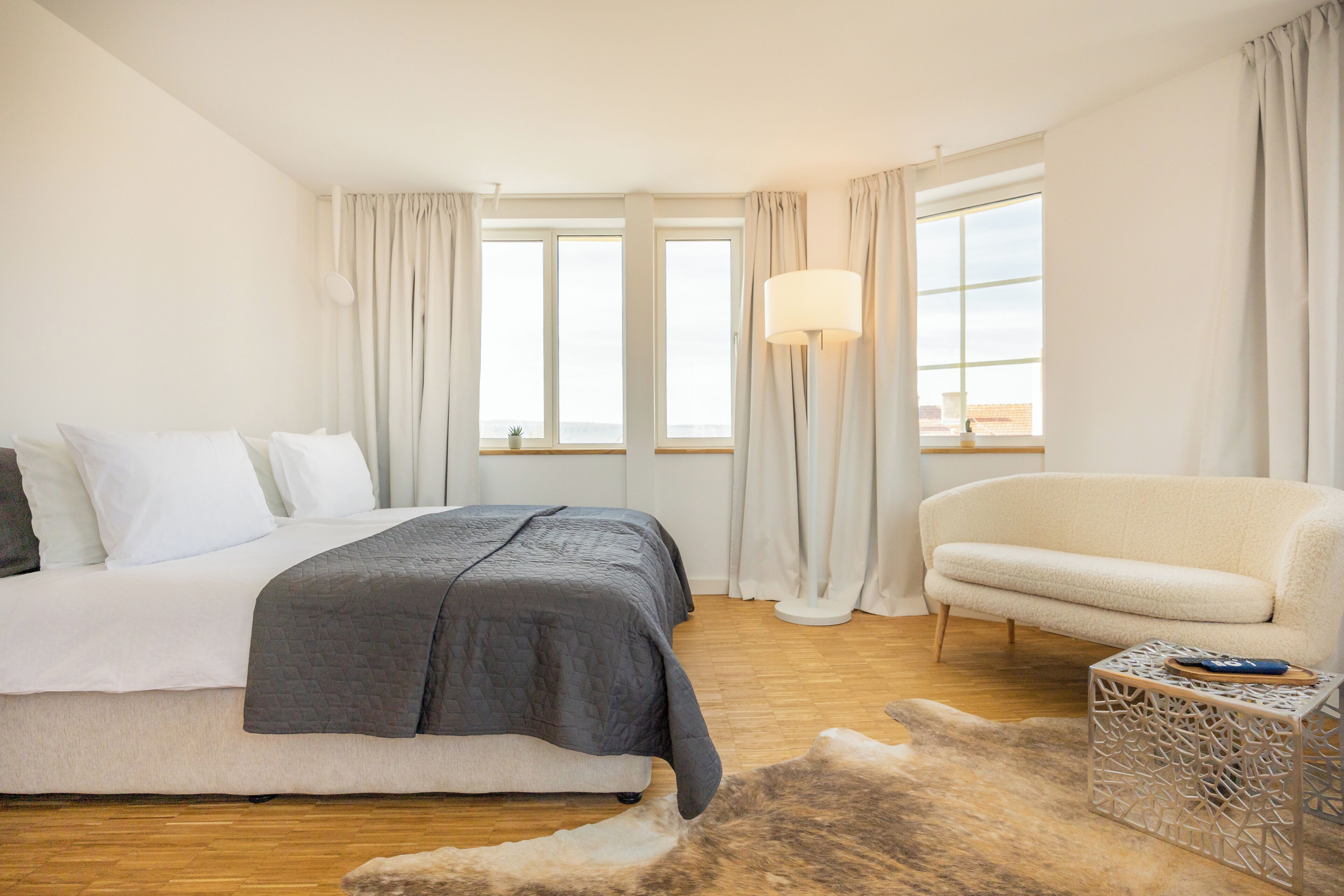 Suite estudio familiar, vista a la ciudad | Cortinas blackout y wifi gratis 