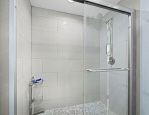Shower, towels, soap, toilet paper