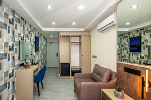 Deluxe Single Room, City View | Desk, laptop workspace, free WiFi