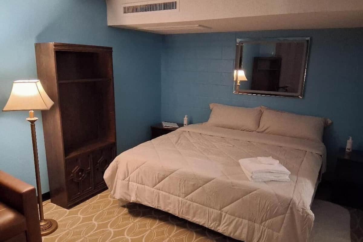 Blackout curtains, iron/ironing board, free WiFi, bed sheets