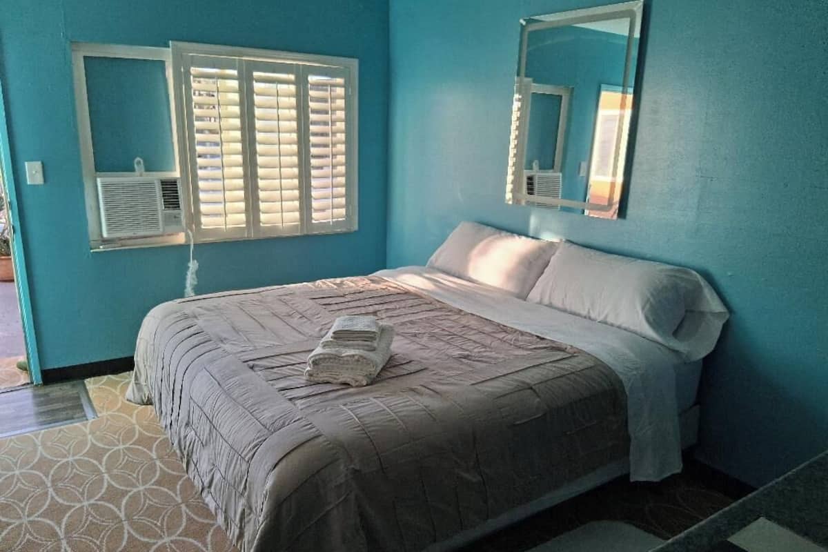 Blackout curtains, iron/ironing board, free WiFi, bed sheets